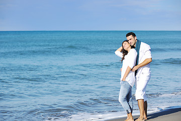 Image showing happy young couple have fun at beautiful beach