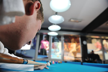 Image showing young man play pro billiard game 