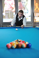 Image showing young man play pro billiard game 