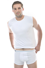 Image showing healthy fit young man islated on white background