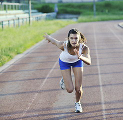 Image showing woman jogging at early morning 