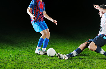 Image showing football players in competition for the ball