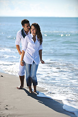 Image showing happy young couple have fun at beautiful beach