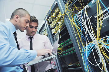 Image showing it engineers in network server room