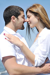 Image showing happy young couple have fun on beach