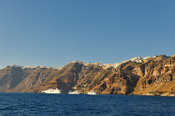 Image showing santorini island coast with luxury yacht