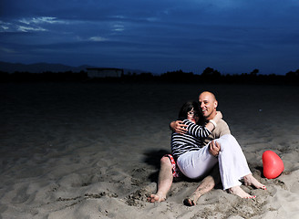 Image showing happy young couple have fun on beach