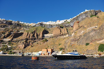 Image showing santorini island coast with luxury yacht