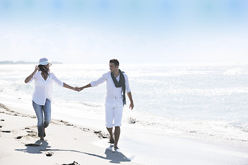 Image showing happy young couple have fun at beautiful beach