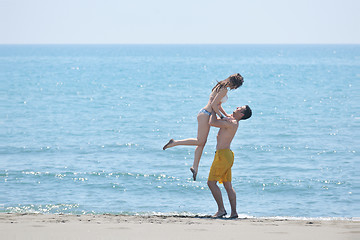 Image showing happy young couple have romantic time on beach