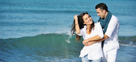 Image showing happy young couple have fun at beautiful beach