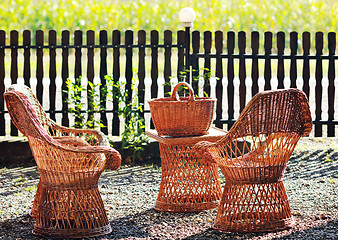 Image showing cane furninture and dishes