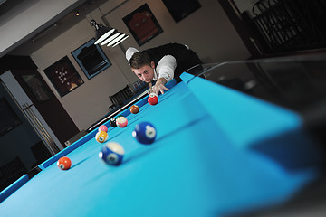 Image showing young man play pro billiard game 