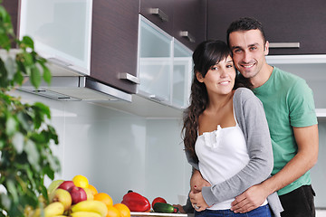 Image showing young couple have fun in modern kitchen