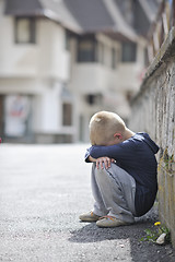 Image showing sad lonely boy on street