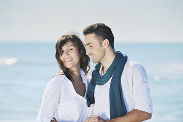 Image showing happy young couple have fun at beautiful beach