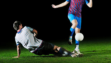 Image showing football players in competition for the ball