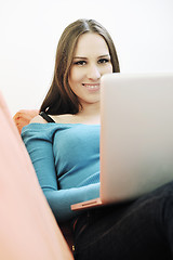Image showing one young woman working on laptop