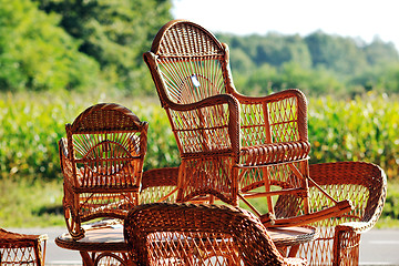 Image showing cane furninture and dishes