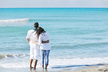 Image showing happy young couple have fun at beautiful beach