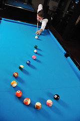 Image showing young man play pro billiard game 