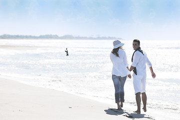 Image showing happy young couple have fun at beautiful beach