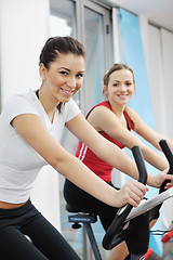 Image showing woman workout  in fitness club on running track 