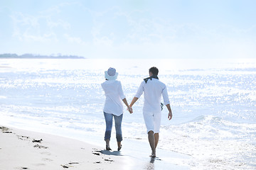 Image showing happy young couple have fun at beautiful beach