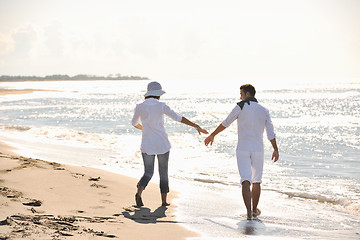 Image showing happy young couple have fun at beautiful beach