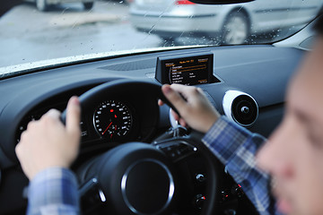 Image showing man using car navigation