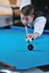 Image showing young man play pro billiard game 