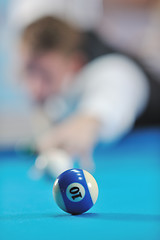 Image showing young man play pro billiard game 