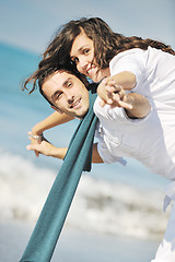 Image showing happy young couple have fun at beautiful beach