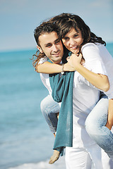 Image showing happy young couple have fun at beautiful beach