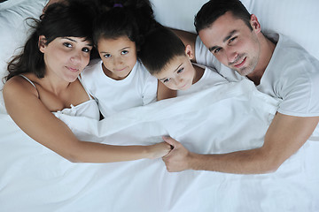 Image showing happy young Family in their bedroom