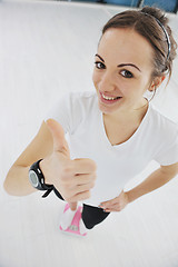 Image showing happy diet concept with young woman on pink scale