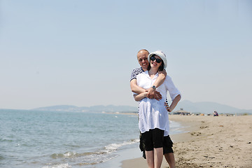 Image showing happy young couple have fun on beach