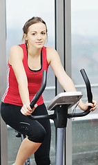 Image showing woman workout  in fitness club on running track 