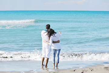 Image showing happy young couple have fun at beautiful beach