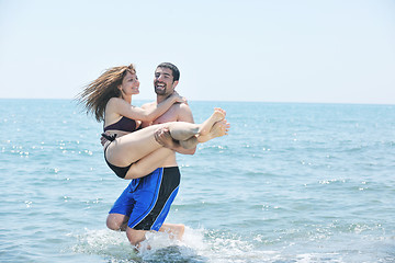 Image showing happy young couple have romantic time on beach