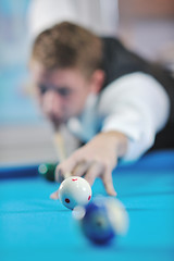 Image showing young man play pro billiard game 