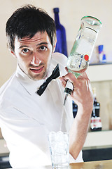 Image showing pro barman prepare coctail drink on party