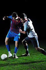 Image showing football players in competition for the ball