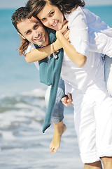 Image showing happy young couple have fun at beautiful beach