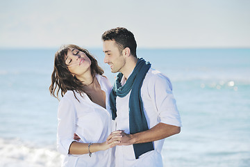 Image showing happy young couple have fun at beautiful beach