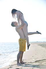 Image showing happy young couple have romantic time on beach