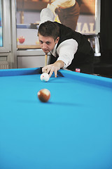 Image showing young man play pro billiard game 