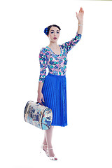 Image showing pinup retro  woman with travel bag isolated