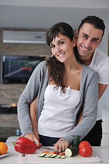 Image showing young couple have fun in modern kitchen