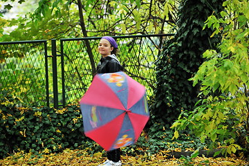 Image showing happy girl with umbrella